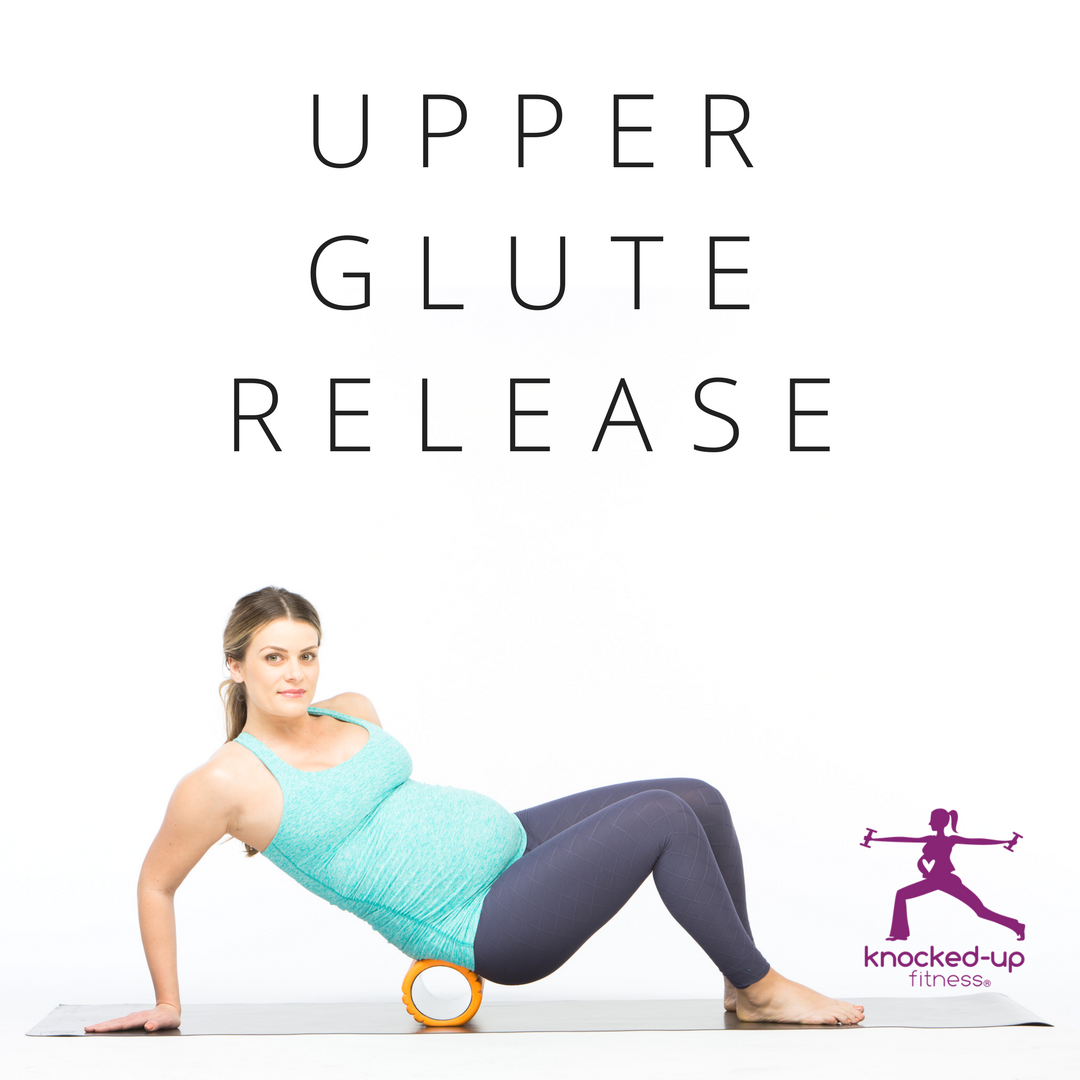 picture of upper glute release exercise in prenatal fitness certification