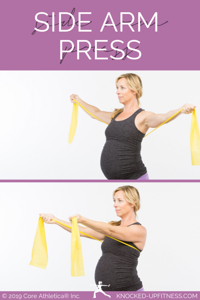 picture of a woman performing side arm at home pregnancy workout
